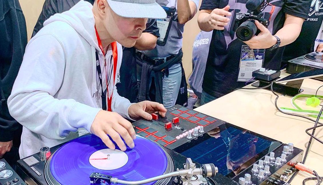 Qbert launching the Invader DJ mixer at NAMM 2019