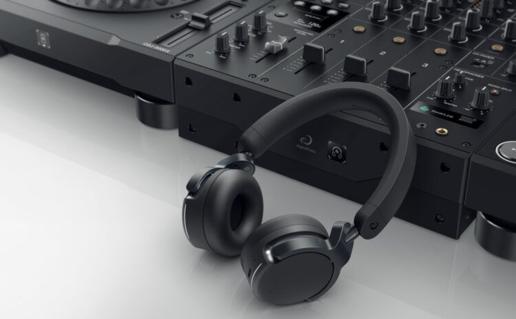 HDJ-F9 headphones next to a DJM-V5 mixer